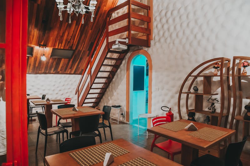 Warm and welcoming dining room interior at Dions restaurant