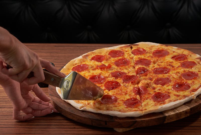 Fresh dions pizza with premium toppings ready to serve