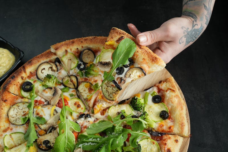 Fresh house salad served alongside dion's pizza at Dions